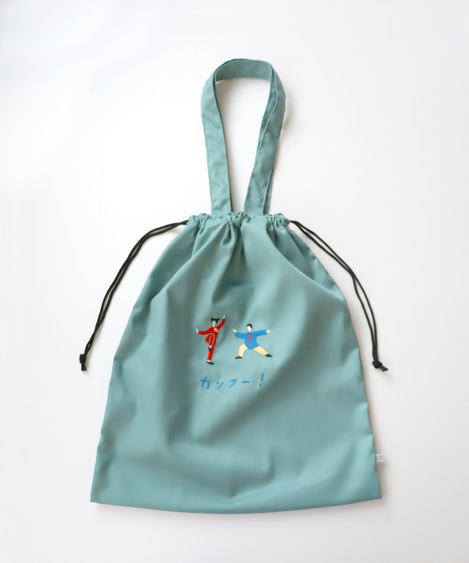 ★予約アイテム10％OFF★ コミカル刺繍 巾着バッグ